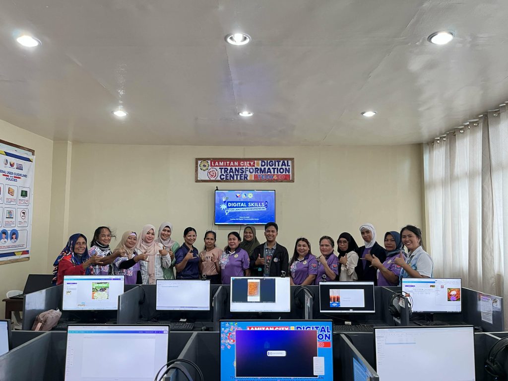 Women entrepreneurs in Lamitan City receive digital skills training from the Department of Information and Communications Technology.