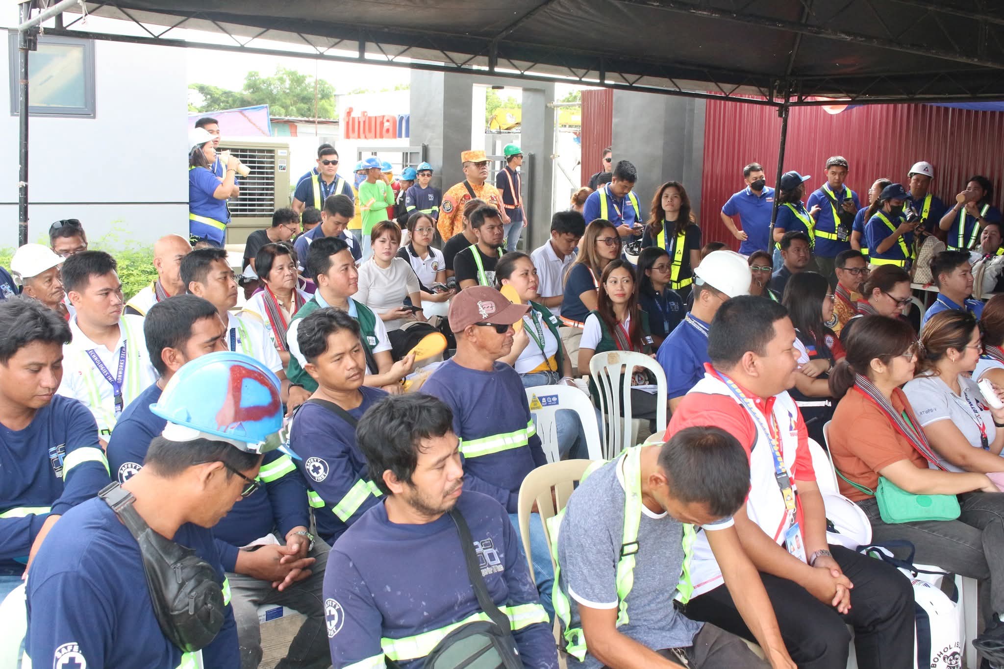 Construction workers, contractors and government representatives attend the DOLE Bicol High Impact, High Visibility Inspection and Monitoring (HIHVIM) activity at Futura Monte by Filinvest Land in Barangay Triangulo, Naga City. (NFrilles/PIA 5-Camarines Sur)