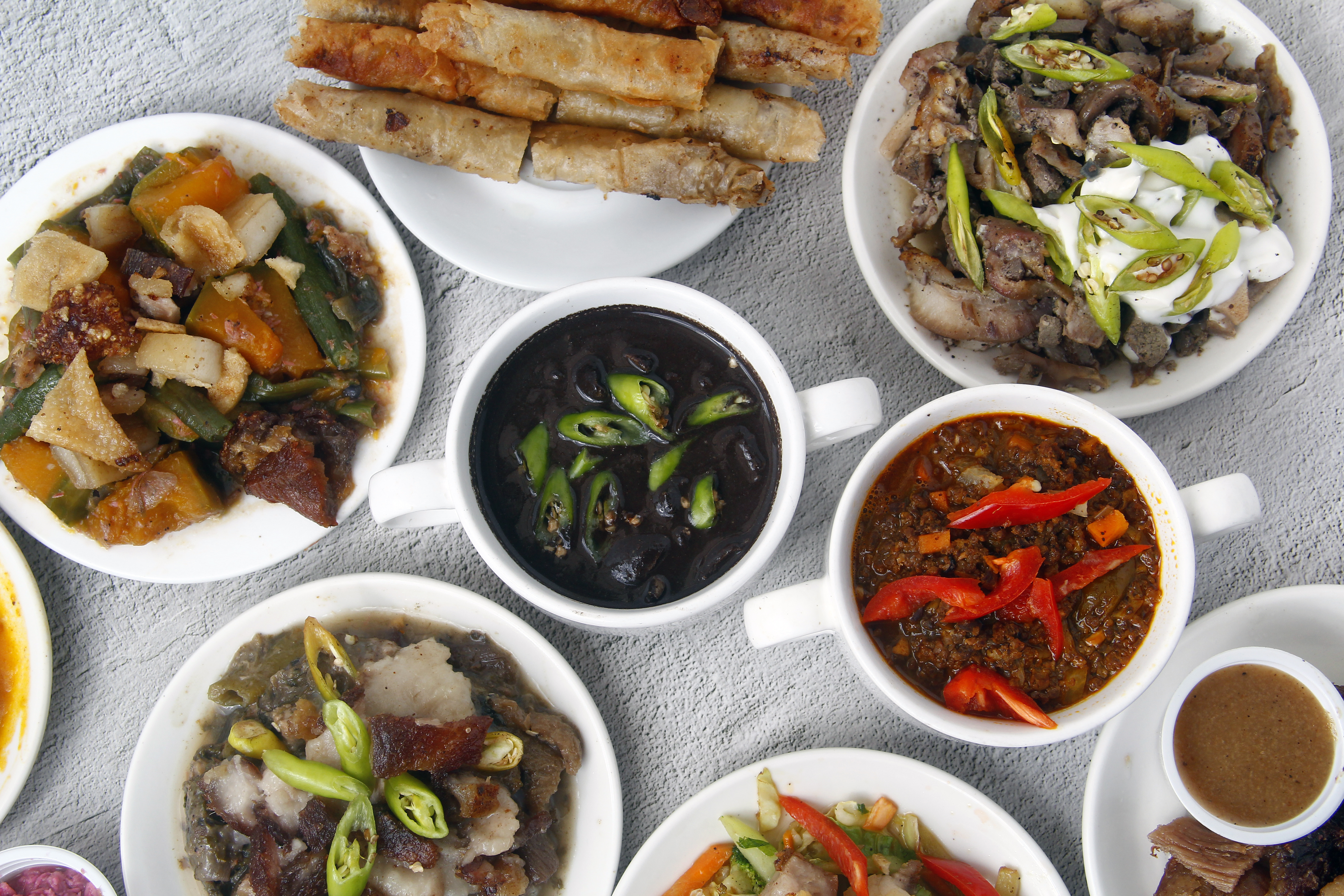 Various Filipino Dishes on Display Ready to Eat