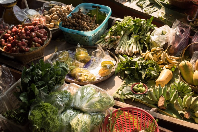 Fruits And Vegetables At The Floating Market In Bangkok, ThailandFotoFeast