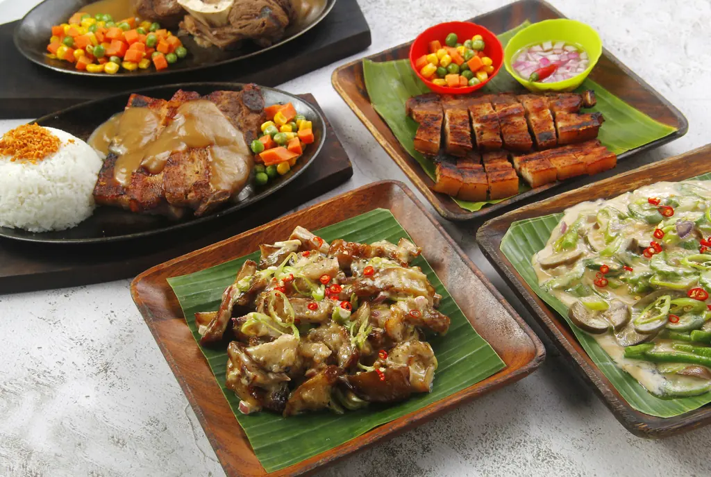 Delicious Filipino Food on Wooden Plates