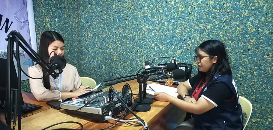 Health Education and Promotion Officer II Venie Gumihid of the Office of the Provincial Health Officer discusses Japanese Encephalitis prevention during a radio program at Radyo Kataguwan 97.3 FM in Bauko, Mountain Province on July 14, 2026, following the confirmation of two JE cases in Bontoc.