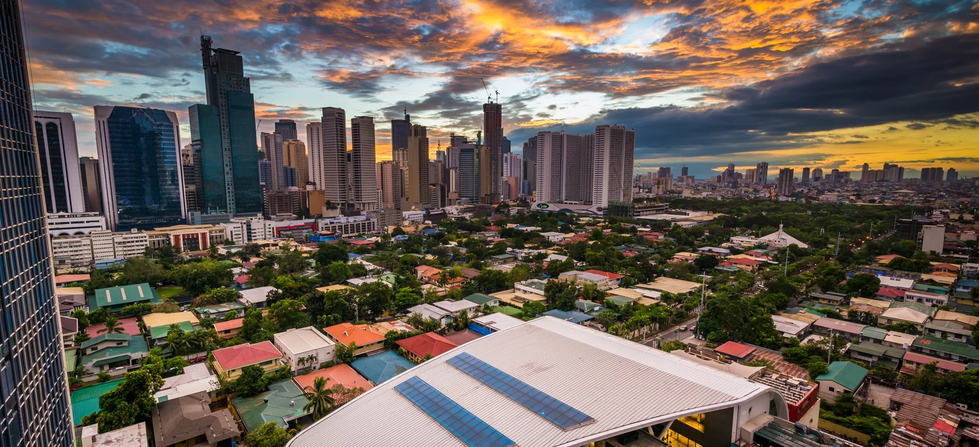 Philippine skyline at sunset as a symbol of the investor visa in Bataan